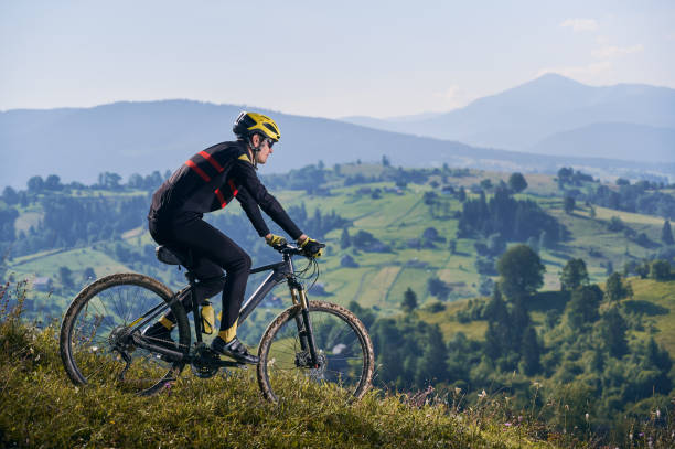 istock Young man riding a mountain bike downhill style 1300438715