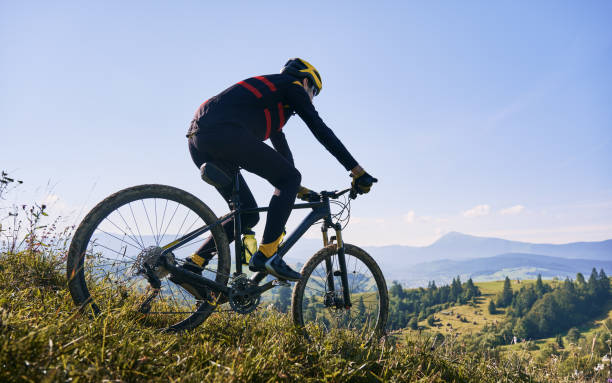 istock Young man riding a mountain bike downhill style 1300438717