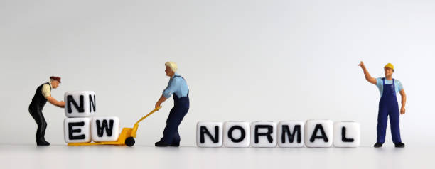 istock The concept of preparing a New Normal. Two miniature 1300438856