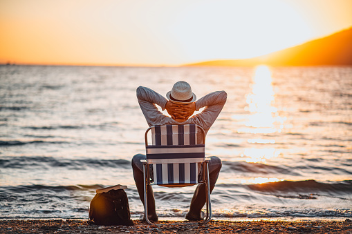 Man Enjoying the Beach at Sunset