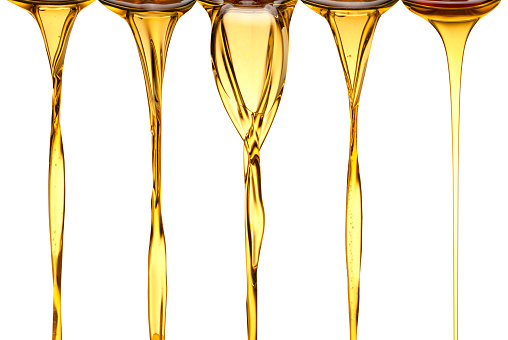 conjunto de aceite de oliva natural flujo de aceite de oliva flujo natural de aceite, aceite vegetal, aceites de sésamo de girasol de cacahuete photo