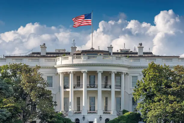 The White House in Washington DC at summer day. The White House is home of the President of the United States of America, Washington DC, USA.