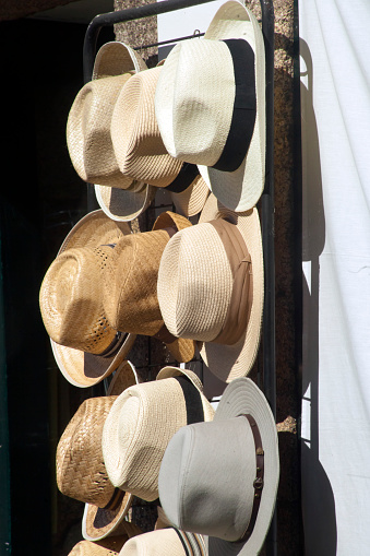 Display of hats in a hat shop window, old town Betanzos, A Coruña province, Galicia, Spain.