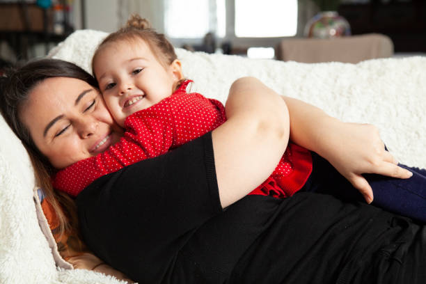 istock mother and daughter very happy hugging each other 1300449320