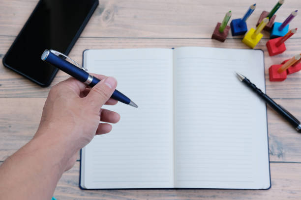 istock Notebook paper on the table, business idea concept 1300450677