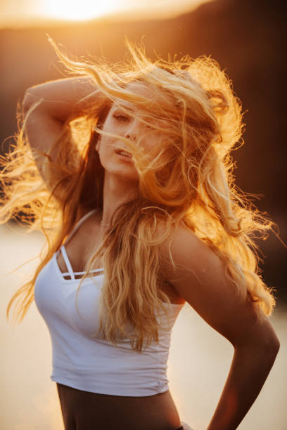 istock Sensual young woman at sunset 1300453519