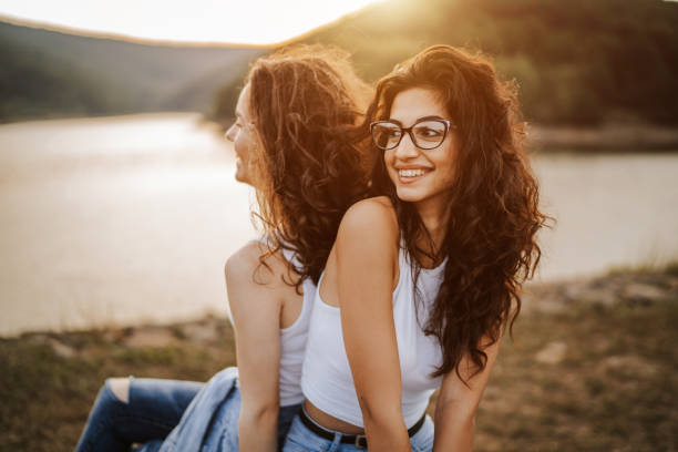 istock Enjoying summer sunset on lakeshore 1300453642