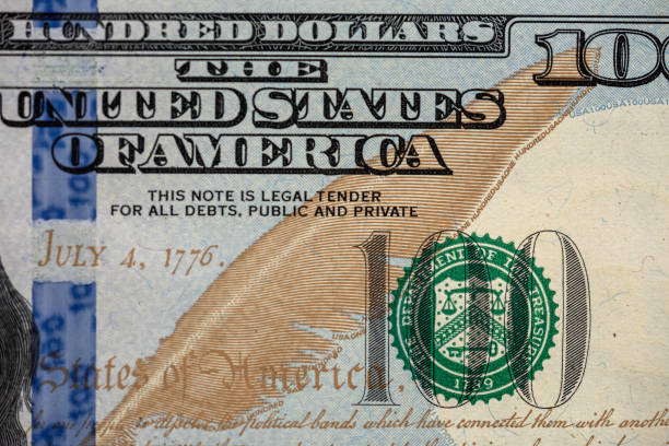 istock close up of US 100 dollar bills 1300453821
