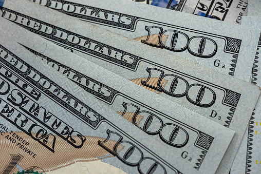 closeup of 100 dollar bill financial concept