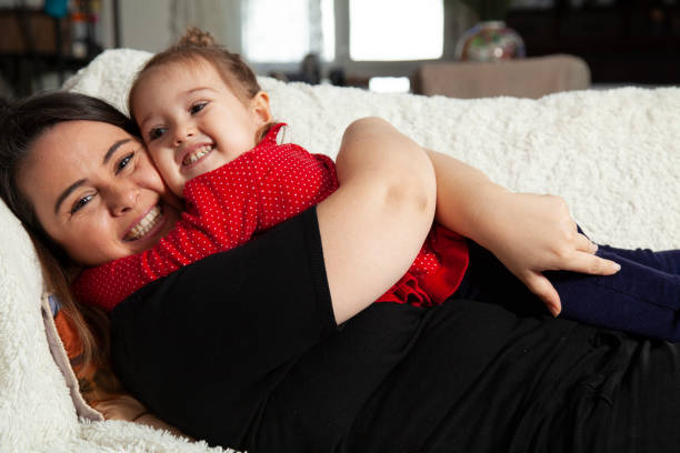 istock mother and daughter very happy hugging each other 1300454792