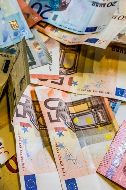 Euro banknotes A composition of euro banknotes providing great options to be used for illustrating subjects as business, banking, media, etc. european union euro note stock pictures, royalty-free photos & images