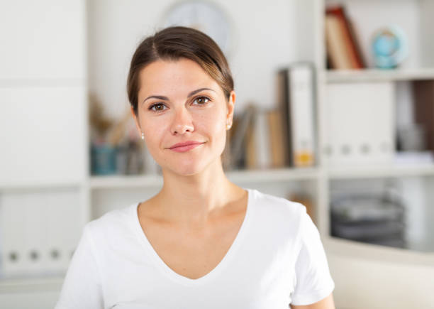 istock Successful business woman posing in office 1300459046