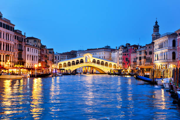 istock Rialto Bridge at sunset in Venice, Italy 1300461182