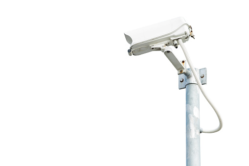 CCTV Camera in weather sealed housing outdoor unit setup on post isolated on white background