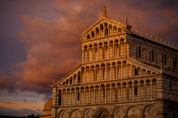 San Giovanni Baptistery, Pisa Cathedral and Leaning Tower of Pisa at sunrise. Pisa ,Tuscany region, Italy