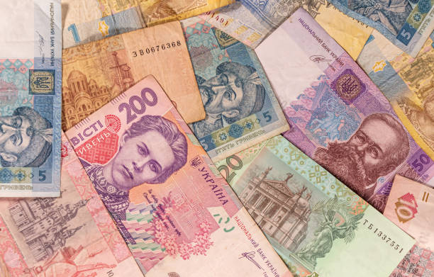 Ukrainian hryvnia. UAH banknotes A composition of Ukrainian hryvnia. UAH banknotes providing great options to be used for illustrating subjects as business, banking, media, etc. ukrainian currency stock pictures, royalty-free photos & images