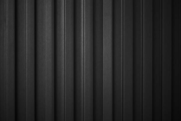 Striped Black wave steel metal sheet cargo container line industry wall texture pattern for background.
