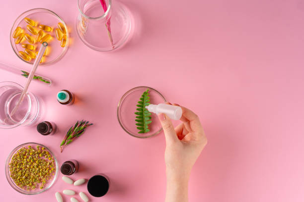 istock Herbs and Herbal dietary supplements top view on pink background 1300466957