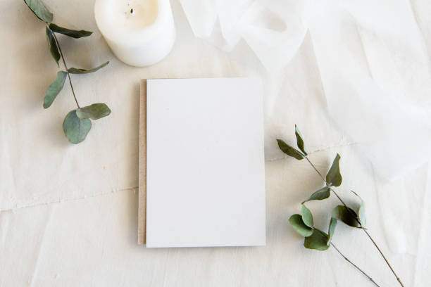 istock Vintage white background and blank postcard - white background and copy space. A romantic greeting card. Wedding feminine invitation. 1300467386