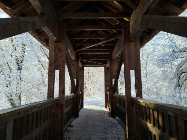 istock little wooden bridge in winter 1300468829