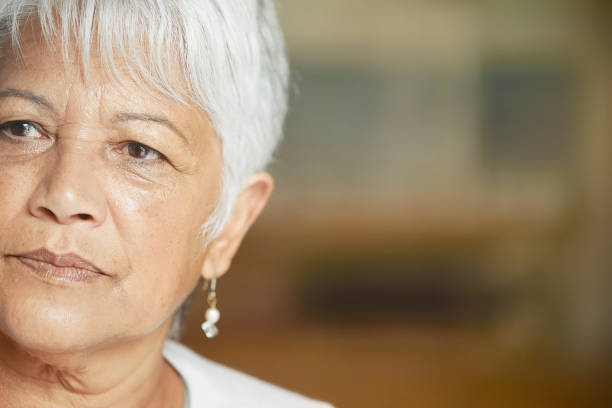 istock Beautiful senior woman in deep thought 1300470456