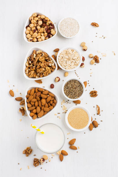 istock Fresh vegan alternative nut milk in glass on white background 1300471229