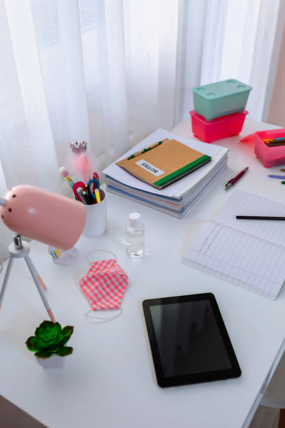istock White desk in girl's bedroom 1300471548