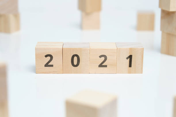 istock 2021 on wooden blocks with a common theme. 1300471662