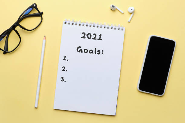 istock The concept of setting goals for the year 2021 in the diary. 1300471676