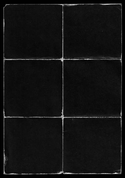 istock Old Black Empty Ripped Folded Torn Cardboard Paper Poster. Grunge Scratched Old Shabby Surface. Distressed Overlay Texture for Collage. 1300471905
