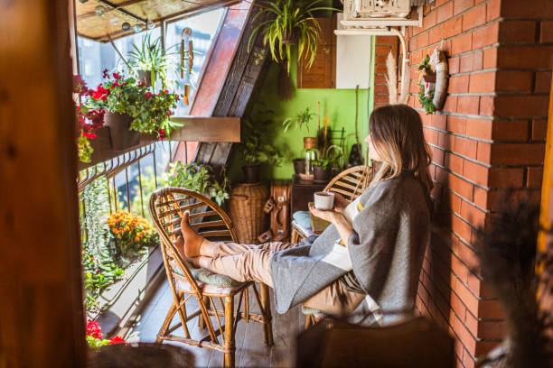 istock Woman enjoying on a terrace 1300472557