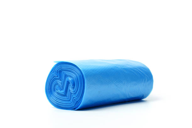 istock Garbage bags in blue isolated on white background 1300472777