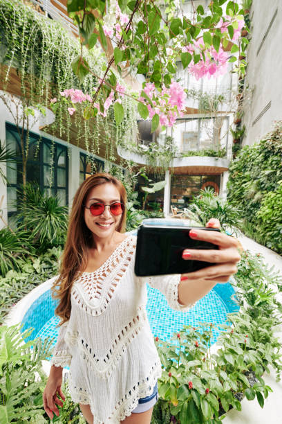 istock Vietnamese woman posing for selfie 1300472953