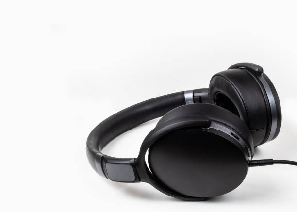 istock black headphones on white background 1300474331