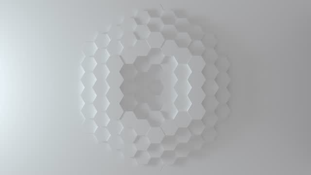 Abstract Honeycomb Background Loop wide angle. Bright white 3D animation of a seamless loop of hexagon beehive. Great modern trends. Light, minimal, moving hexagonal grid. Loopable