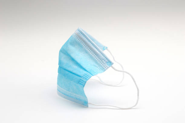 istock Medical protective mask on white background. PPE Surgical disposable masks 1300476634