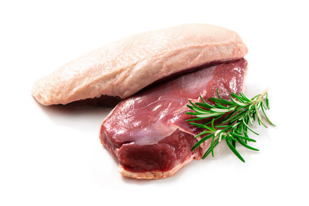 istock Raw duck breast pieces isolated on white background 1300477409