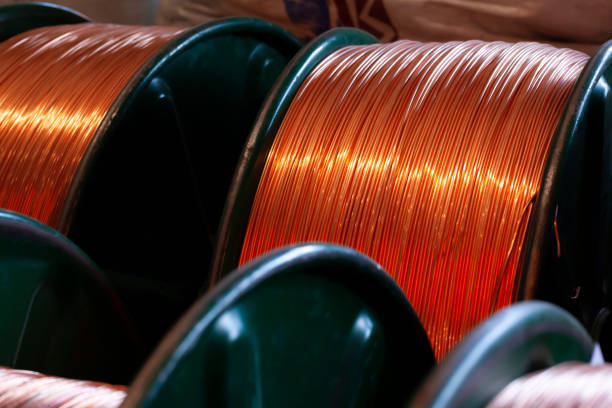 istock Copper wire reels in cable factory close up 1300483234