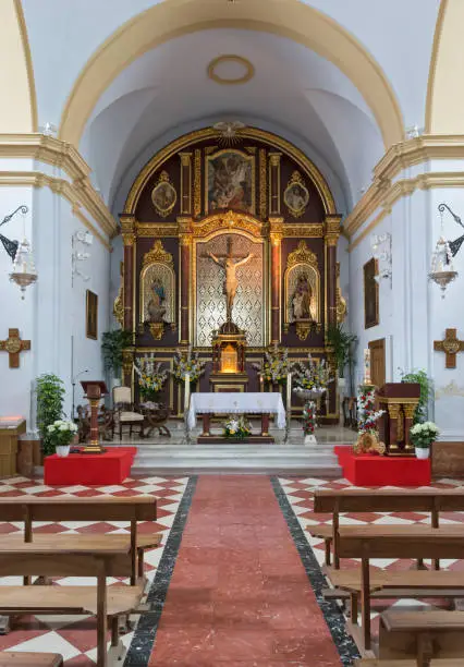 A look inside the "San Antonio" catholic church ("SAINT ANTHONY OF PADUA") in Spanish Frigiliana, it was built in 1676 in renaissance style and restored a century later - it has wooden benches, a tiled floor and is beautifully decorated