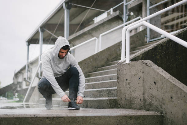 istock Man ready for urban winter running workout 1300484335