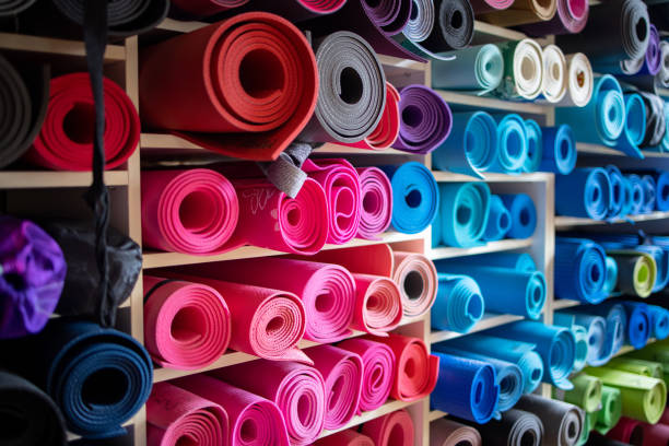 istock Yoga mats on shelves in repository 1300484468
