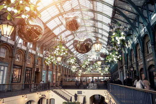 London, UK - December 17, 2020: Interior of the former vegetable market at Covent Garden Market in London West End with Christmas decoration during the holidays