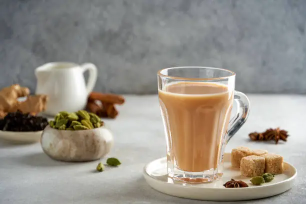Photo of Traditional middle eastern , indian drink masala or karak chai. Closeup