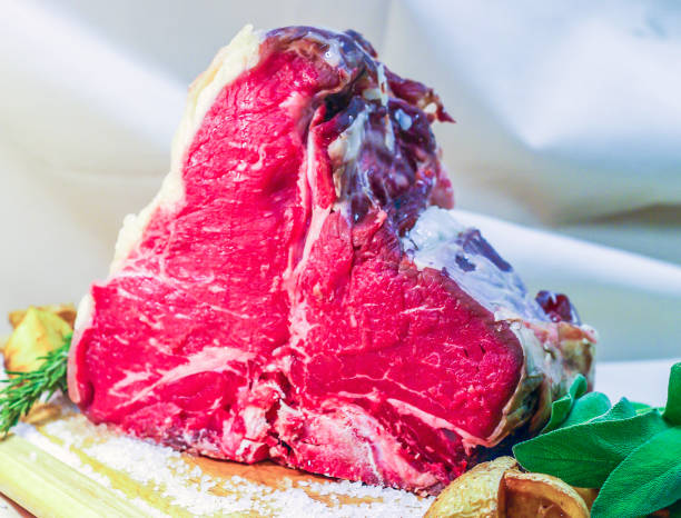 istock beef steak on the bone, ready for your barbeque and lunch, Florentine steak 1300486910