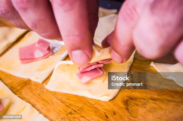 Preparation Of Pretzels With Cheese And Mortadella Cooked In The Oven Stock Photo - Download Image Now
