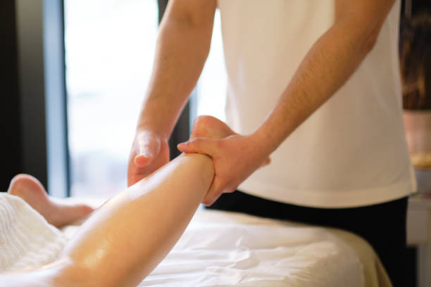 istock Relaxing massage on the foot in spa salon indoors 1300488501