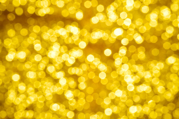 istock Golden glitter bokeh background, gold light defocused background 1300497547