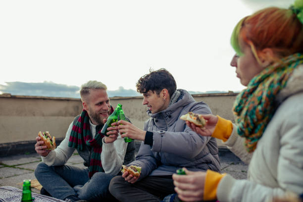 istock Happy Friends Enjoy Rooftop Party 1300498469
