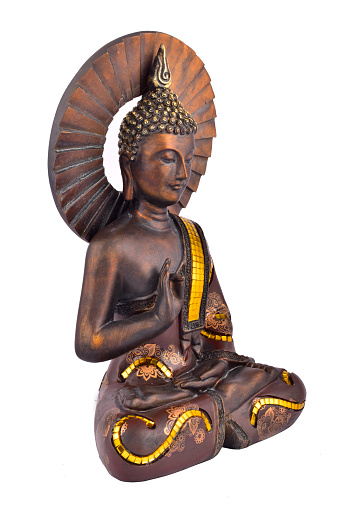 Side view of buddha statue isolated on white background with clipping path