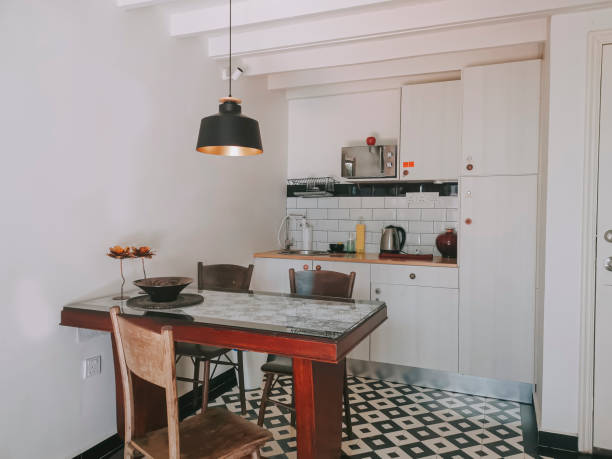 istock interior of housing apartment with kitchen and dining table 1300500374
